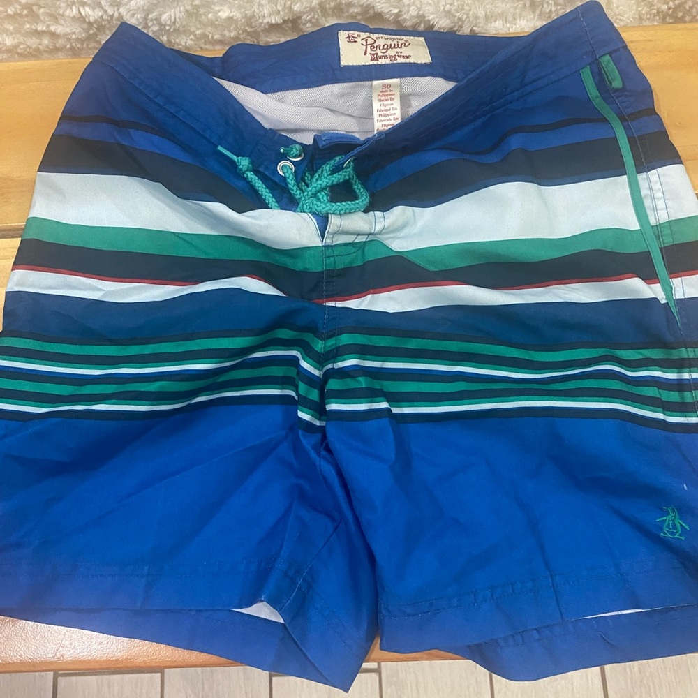 Mens original penguin swim trunks size 30. Two pairs